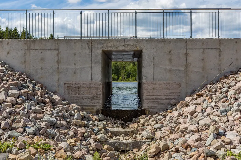 Spillway (uncontrolled) at lake/dam Kuppdammen (aka Kuppen), Garpenberg, Hedemora Municipality, Dalarna County, Sweden.